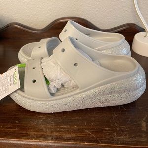 Crocs classic crush glitter sandals. Size 8 but run a little big. NWT.